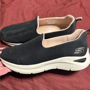 Skechers Women's Black and Cream Slip-On Sneakers
